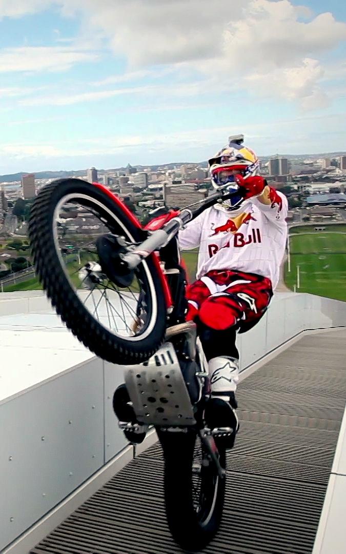 Man performing a trick on a motorbike