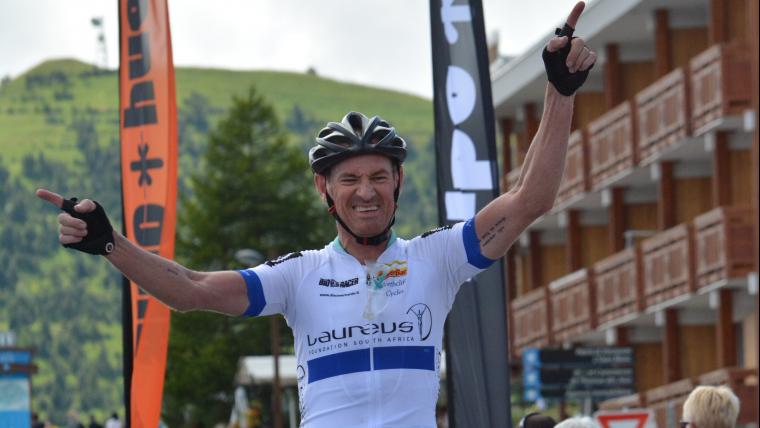 Man celebrating on bicycle