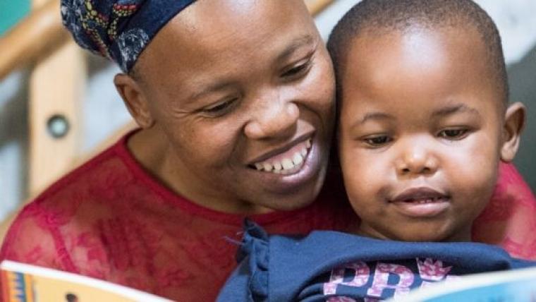 Mother and child reading. 