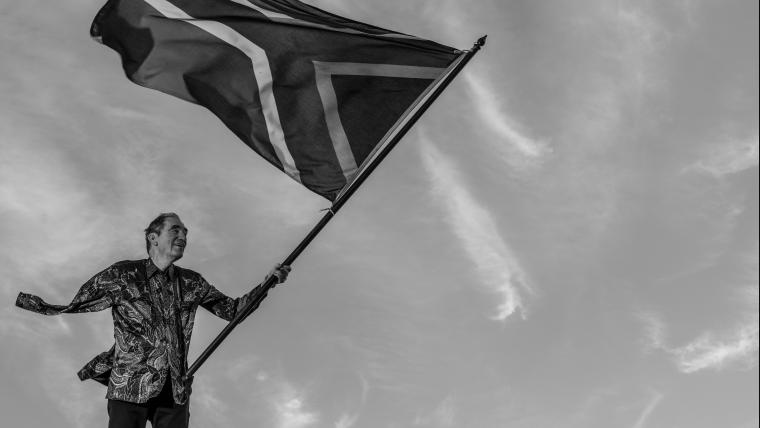 Man holding South African flag