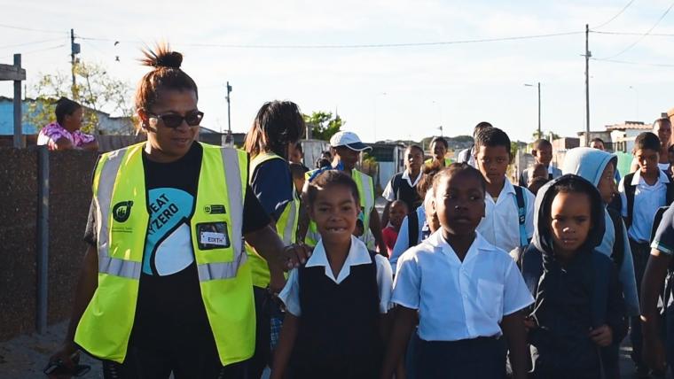 Neighbourhood Watch walking a group of children to school