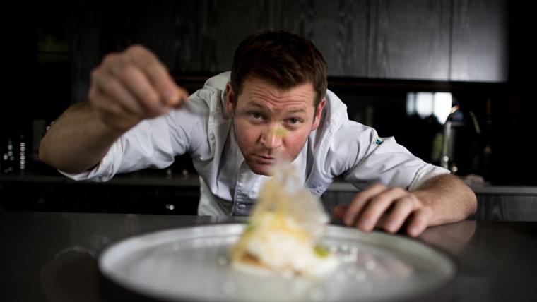 Chef plating up food