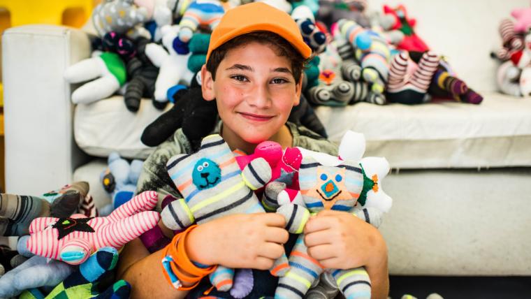 Boy with teddy bears