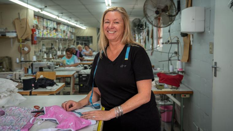 Bra designer Diane Schonegevel in factory