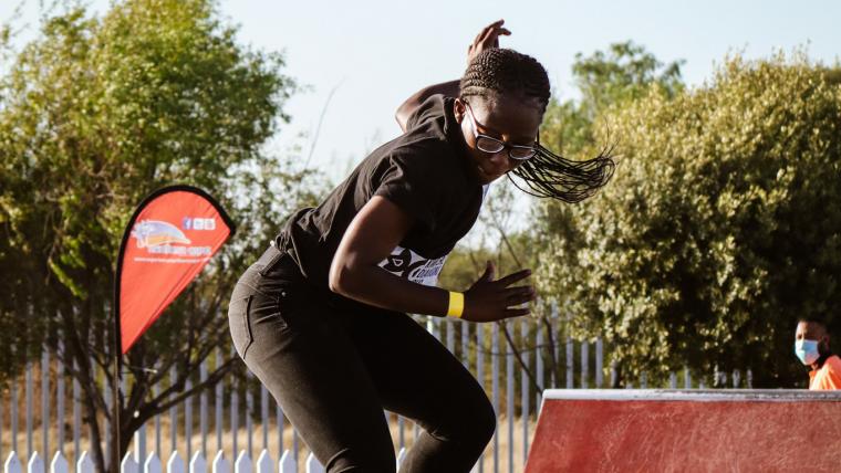 Beautiful News - Boipelo Awuah from Kimberley in Northern Cape South Africa skateboarding on a rail on a 