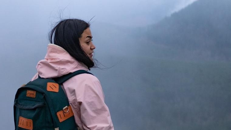 Beautiful News-Woman with backpack