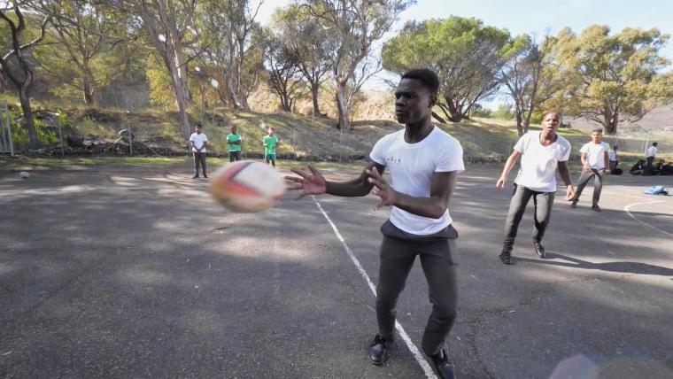 Man catching a ball. 