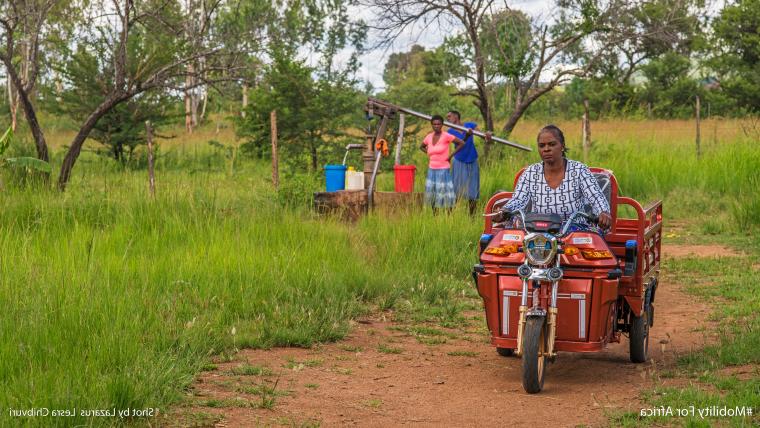 woman in moped. 