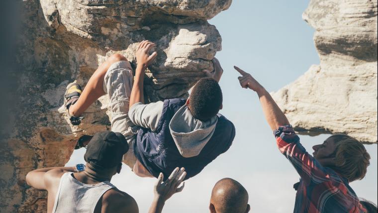 This climber is teaching children how to overcome obstacles