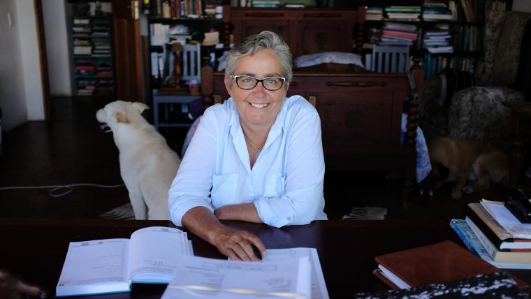 White woman at desk