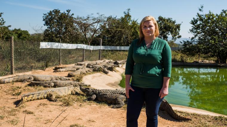 Woman with crocodiles