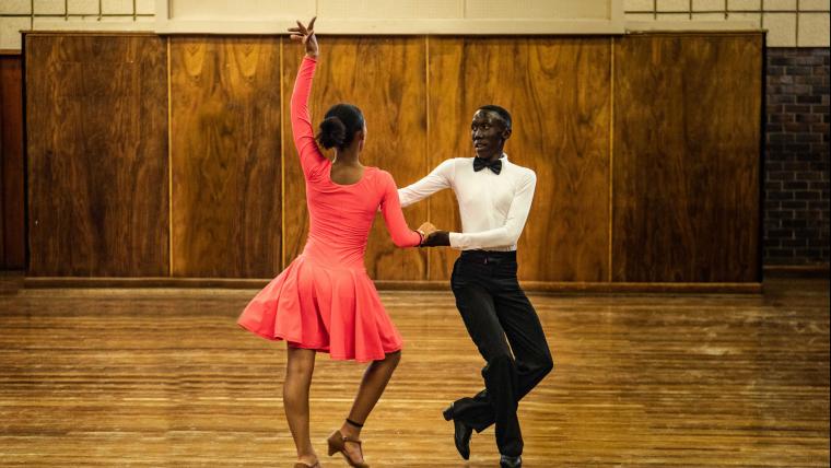 Two dancer doing ballroom dance