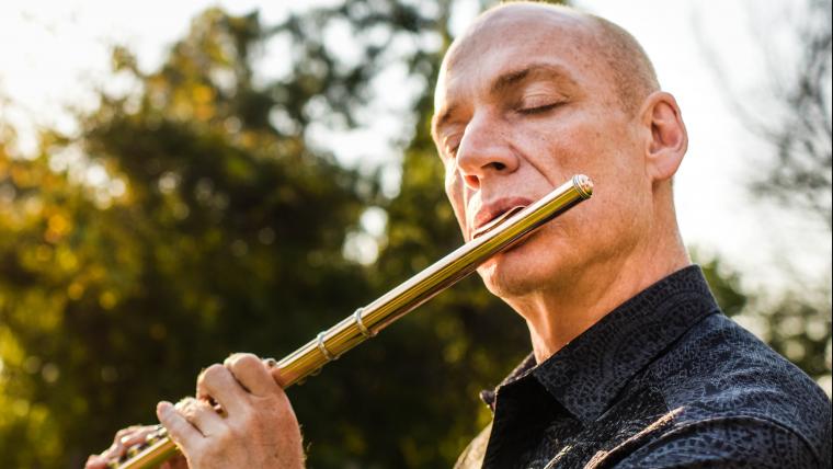 With just a flute and stubborn determination, this musician won a Grammy