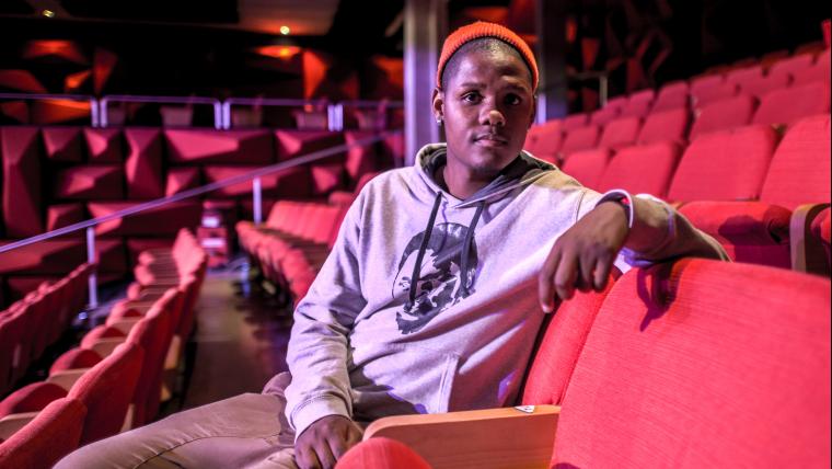 Man sitting in theatre