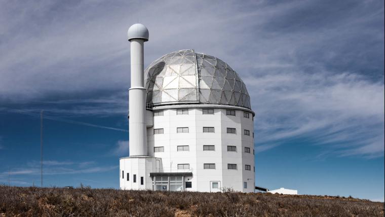 Travel to the desolate Karoo landscape and discover the town where science and tradition collide