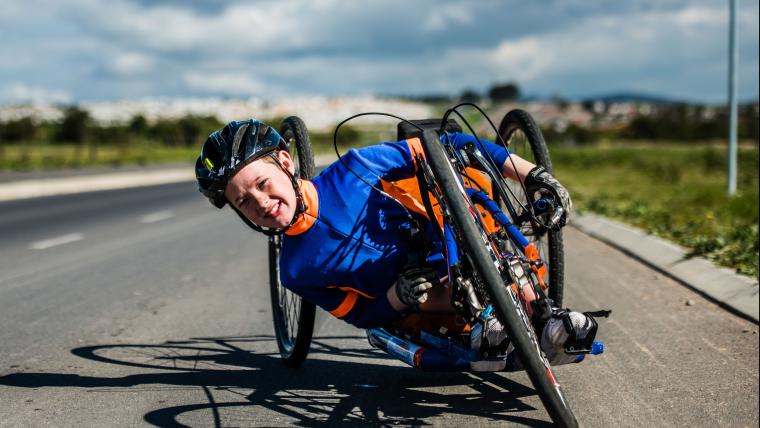 The country’s youngest handcyclist speeds past disability with his winning attitude