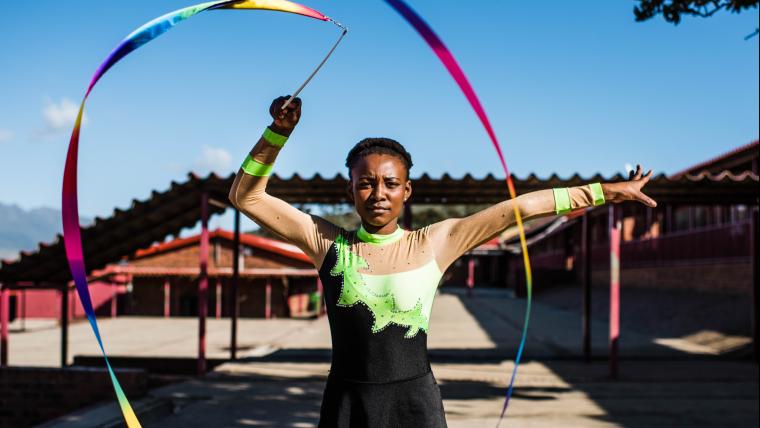 Girl posing with ribbon