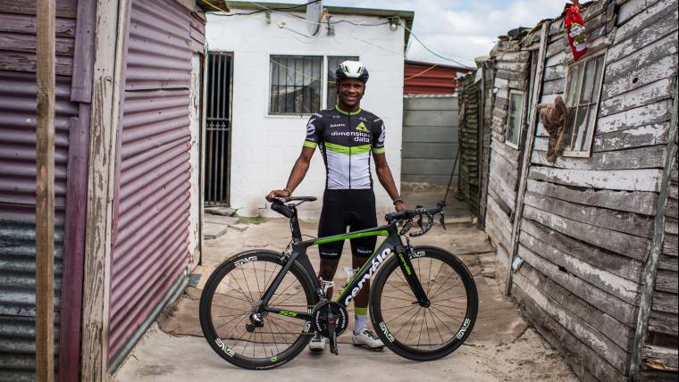 Black man with a bicycle