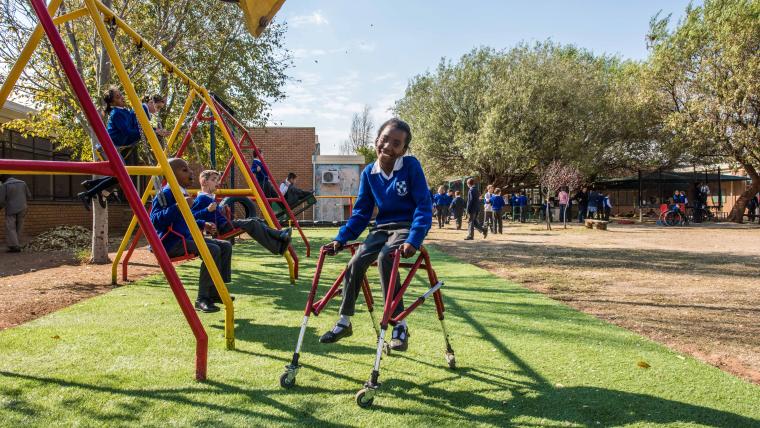 Kids, both abled and differently abled, playing