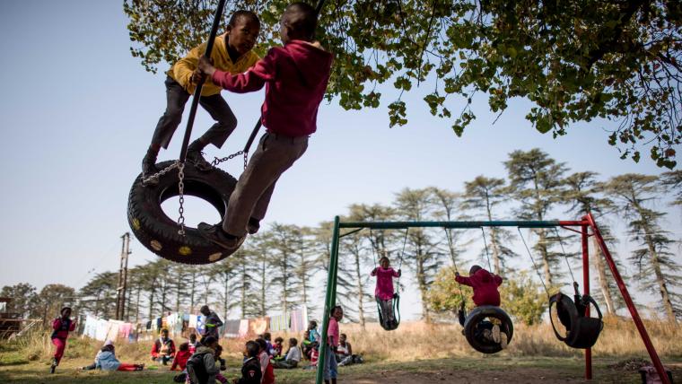 Kids playing on playground. 