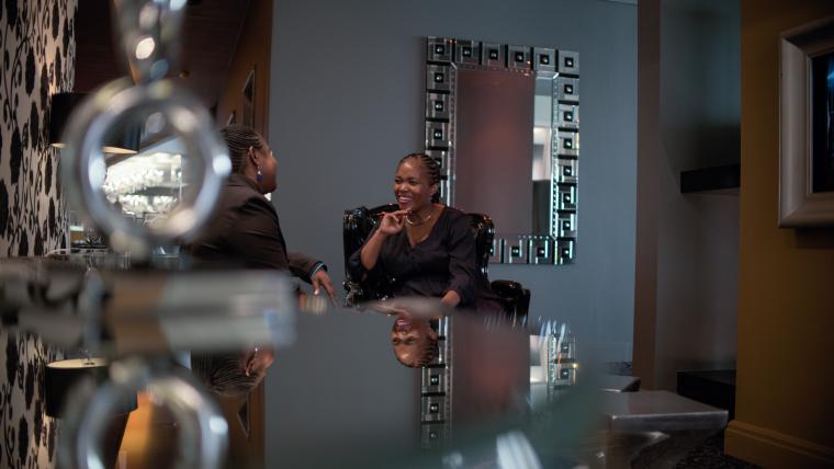 Woman conducting a meeting. 