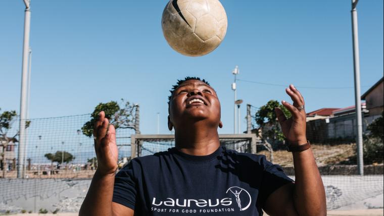 Woman and soccer ball