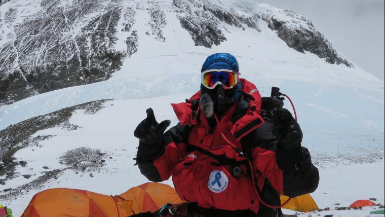 The youngest South African to summit Mount Everest is doing it all to fight the incurable disease devastating his family