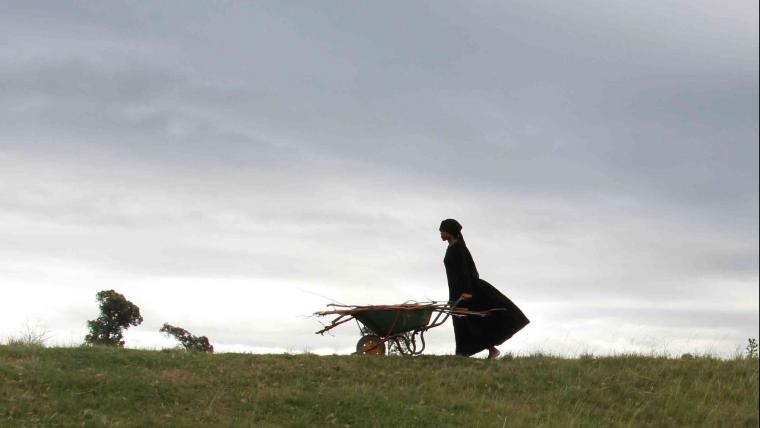 Woman with a wheelbarrow