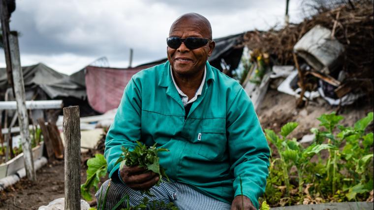 He is blind but he is the gardener.