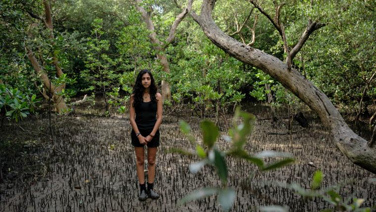 Girl in swamp.