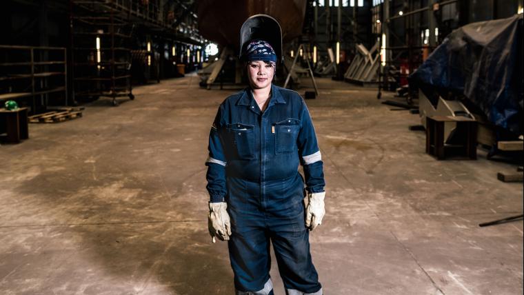 A boilermaker lady, builds ships from start to finish by her hands.