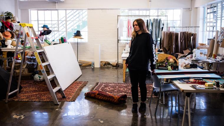 Woman standing in art studio