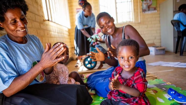 women and children laughing and smiling beautiful news