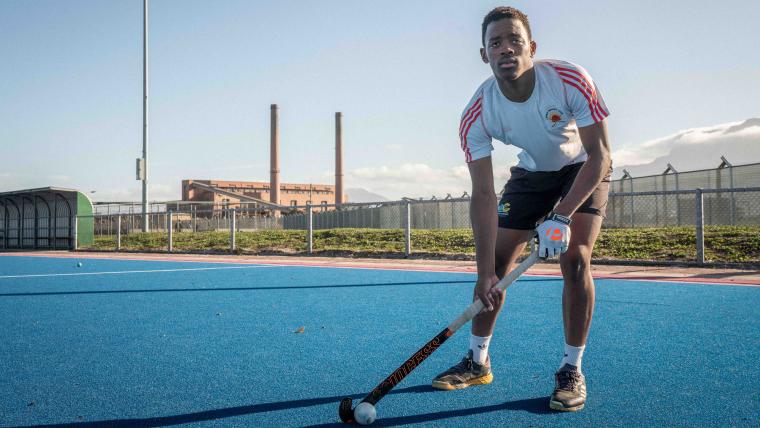 Langa hockey player Litha Kraai in action