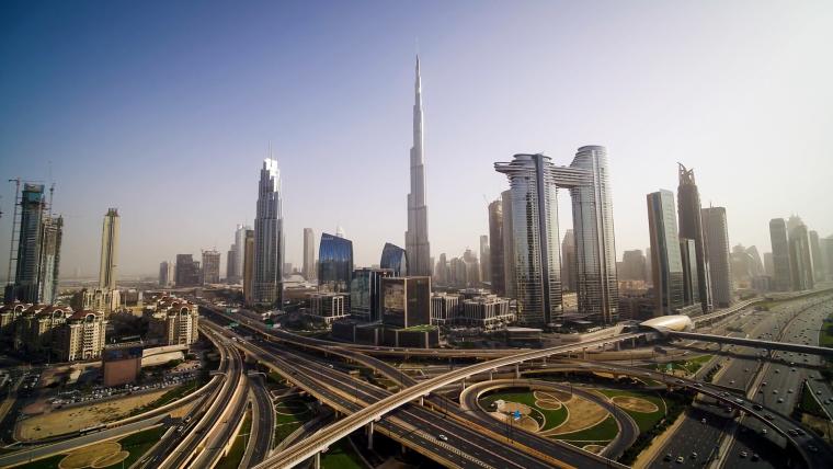Beautiful News - Image shows a bustling Dubai with roads and skyscrapers on full display