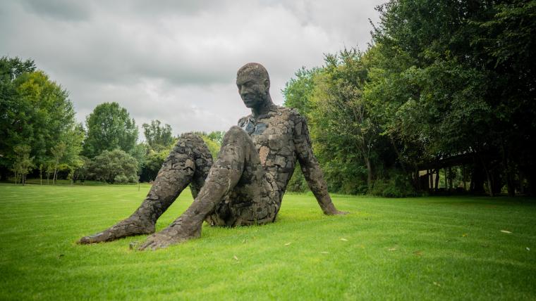 Sculpture on grass. 