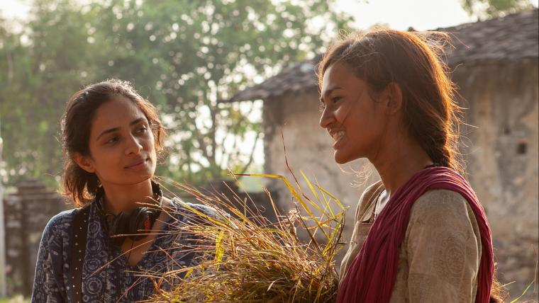 Beautiful News-Two women on a film set.