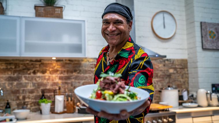 man with bowl of food