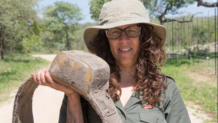 Woman with an elephant collar