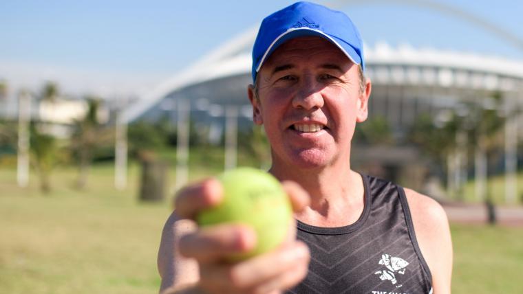 Man Holding Ball.