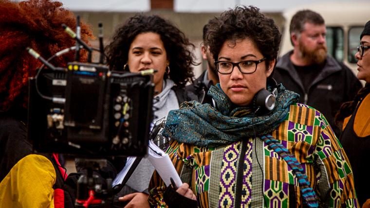 Female director holding a script.