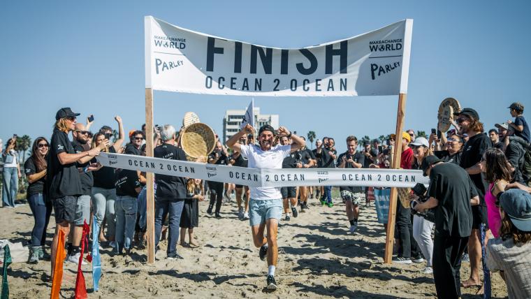 Beautiful News-Man finishing a running event.