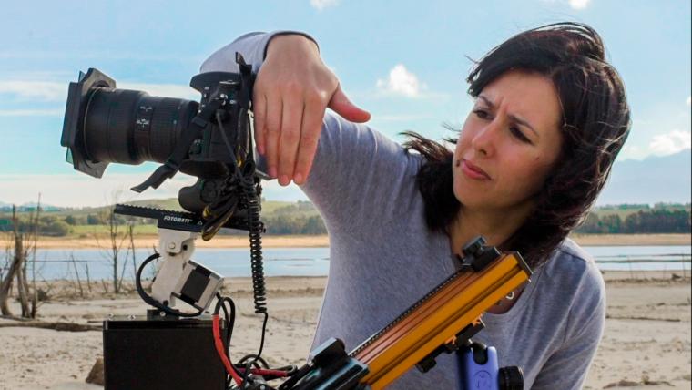 photographer looking at camera