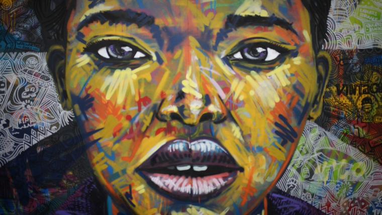 Colourful painting of woman's face