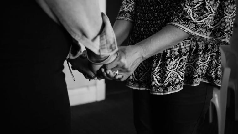 Beautiful News-Black and white image of holding hands