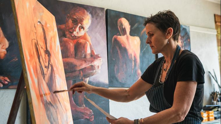 Woman painting.