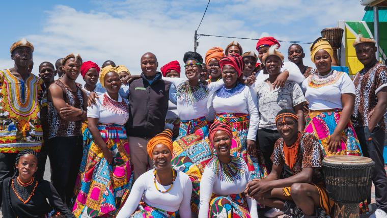 Group of black South Africans in traditional wear.