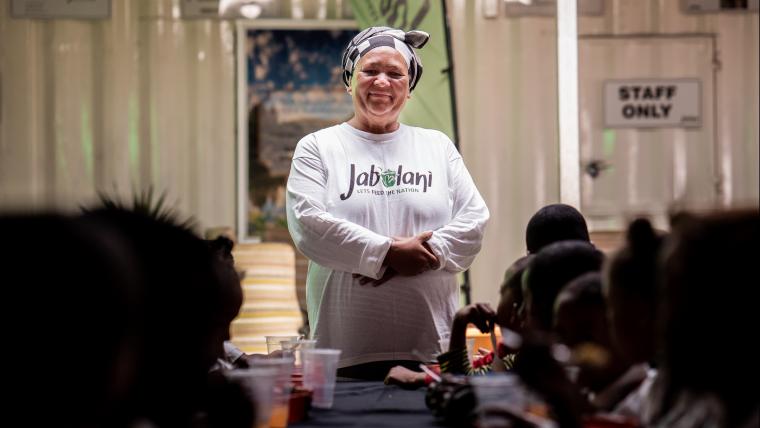 Woman in dining hall.