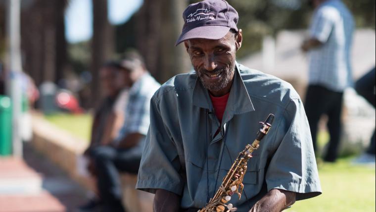 the blind saxophone player bringing joy to the people with the power of music