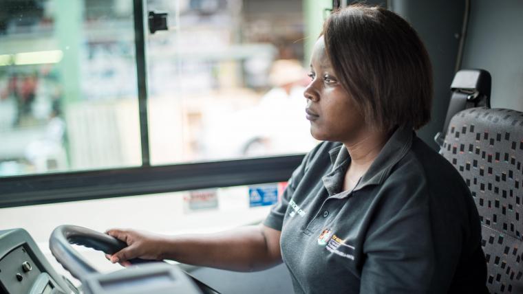 Woman driving a bus